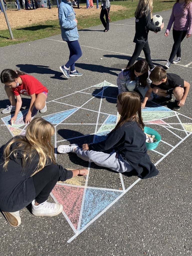 students using sidewalk chalk