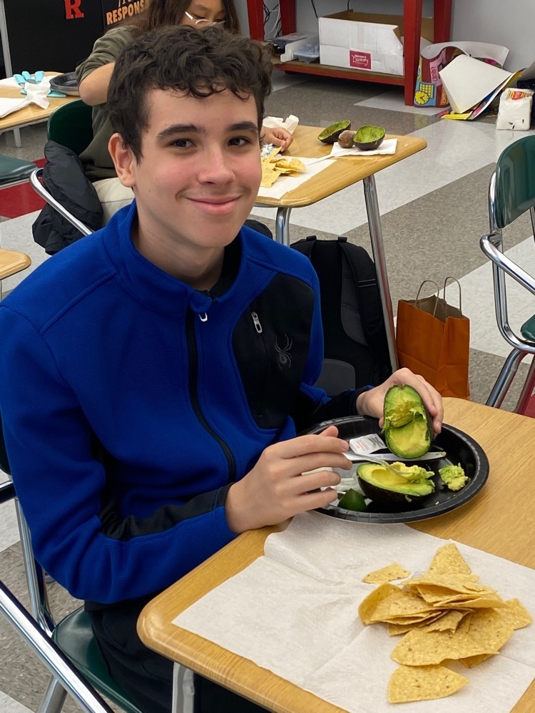 student preparing the avocado 