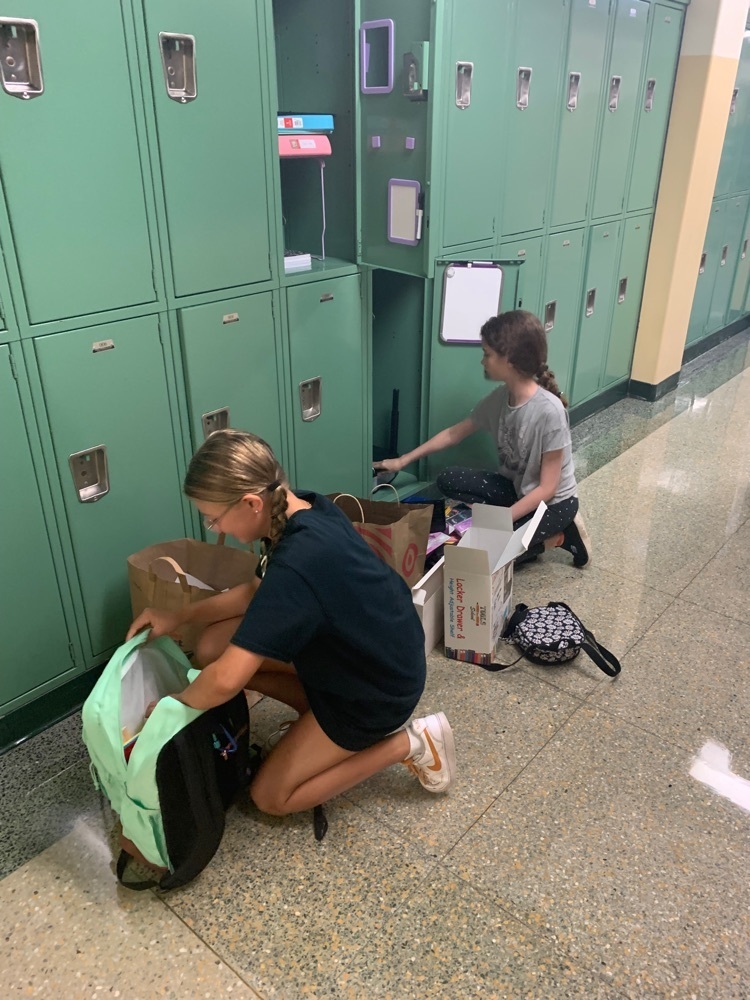 students setting up their lockers 