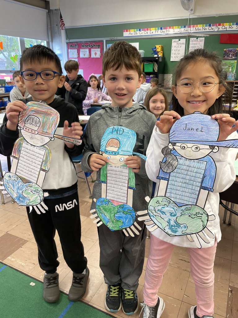 Our 2nd graders focus on Earth Day by placing the world in their hands and are learning ways to take care of it! #JustFocusonGrowing 