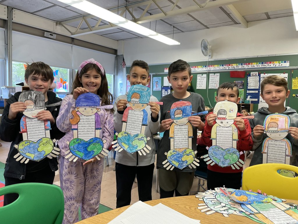 Our 2nd graders focus on Earth Day by placing the world in their hands and are learning ways to take care of it! #JustFocusonGrowing 