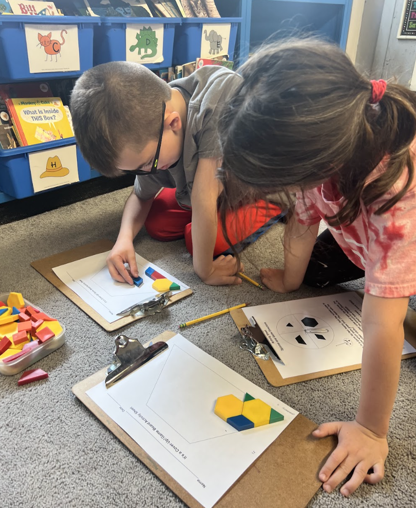 Our 1st graders are exploring shapes and their attributes while working collaboratively! #JustFocusonGrowing